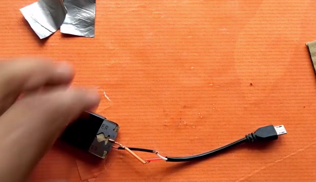 An easy trick to charge a phone without electricity using